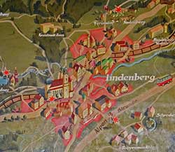 Im Westallgäu begonnen wurde im August 1936 mit einer neuen Teilstrecke. Schon zwei Jahre später war das 9,6 km lange Teilstück Scheidegg (Haus) - Lindenberg - Simmerberg fertig. Gerühmt wurde die landschaftliche Schönheit mit einzigartigen Ausblicken auf die Bergwelt und das Rothachtal. Es mussten für damalige Zeiten gigantische 250000 Kubikmeter Erdaushub befördert werden. Seichte und moorige Stellen bei der Schießstätte auf der Rieder Höhe, in Weihers und vor allem im Ellhofermoos - selbst die Bauleitung war zunächst ratlos, wie die Strecke verlaufen sollte - erschwerten die Arbeiten. Motorbagger und Planierraupen unterstützten die Handarbeit der 500 Männer vom Arbeitsdienst.